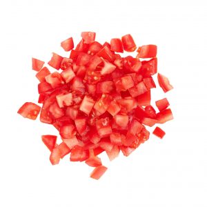 Sliced fresh raw red tomato, cubes, heap, isolated on white back